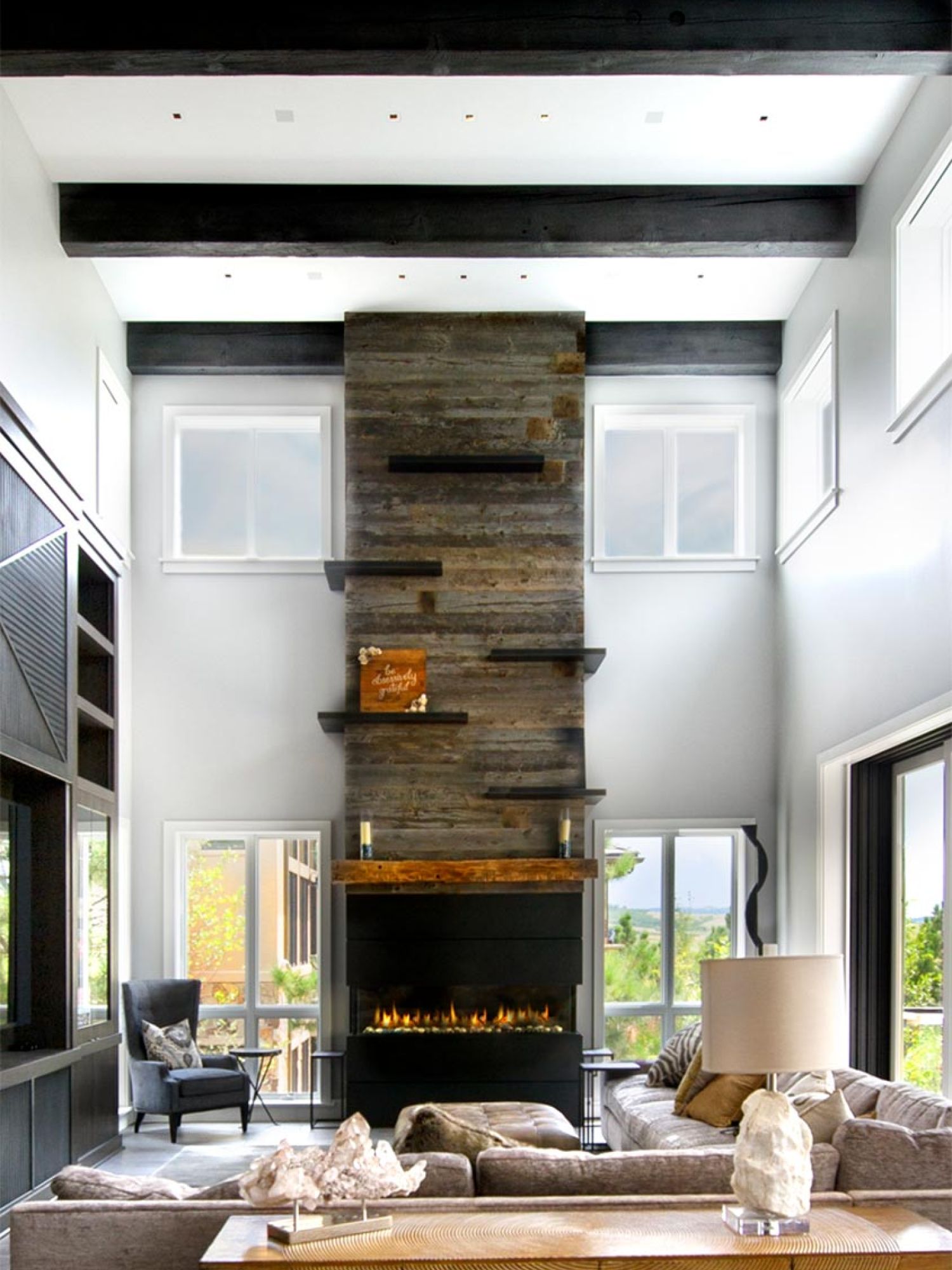 Living room with small aperture speakers and controlled lighting for this modern residence in Santa Monica