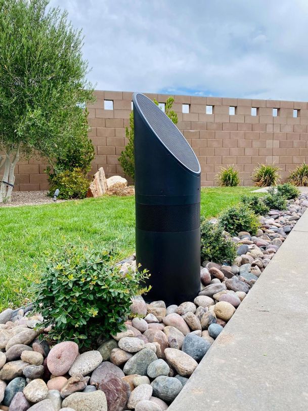 Coastal Source Outdoor Speaker in a walkway with rocks in Agoura Hills