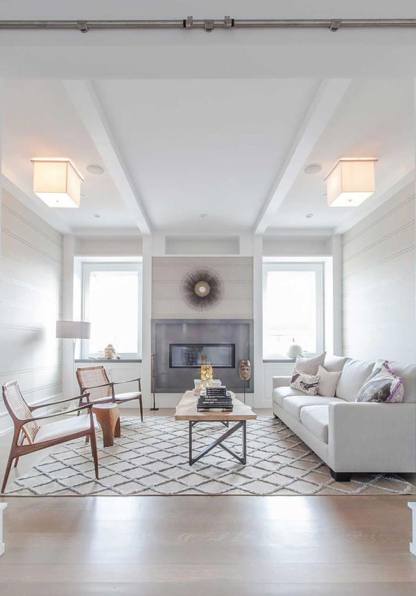 In-ceiling speakers with lighting control in sitting area of Malibu home.