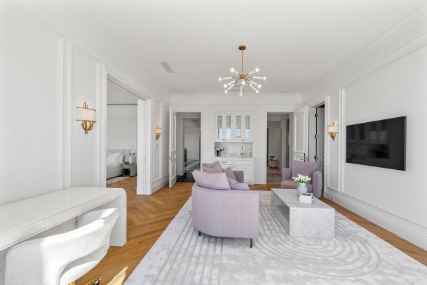 Sitting room with smart TV and controlled lighting in Beverly Hills